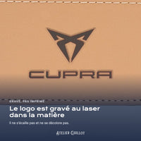 Logo Cupra gravé au laser dans le simili cuir