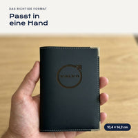 Fahrzeugscheinhülle Volvo aus Kunstleder in einer Hand