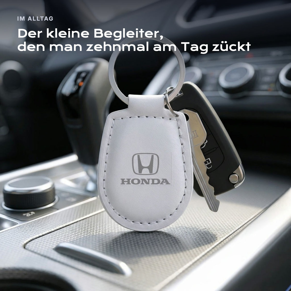 Gravierter Schlüsselanhänger Honda an einem Schlüssel