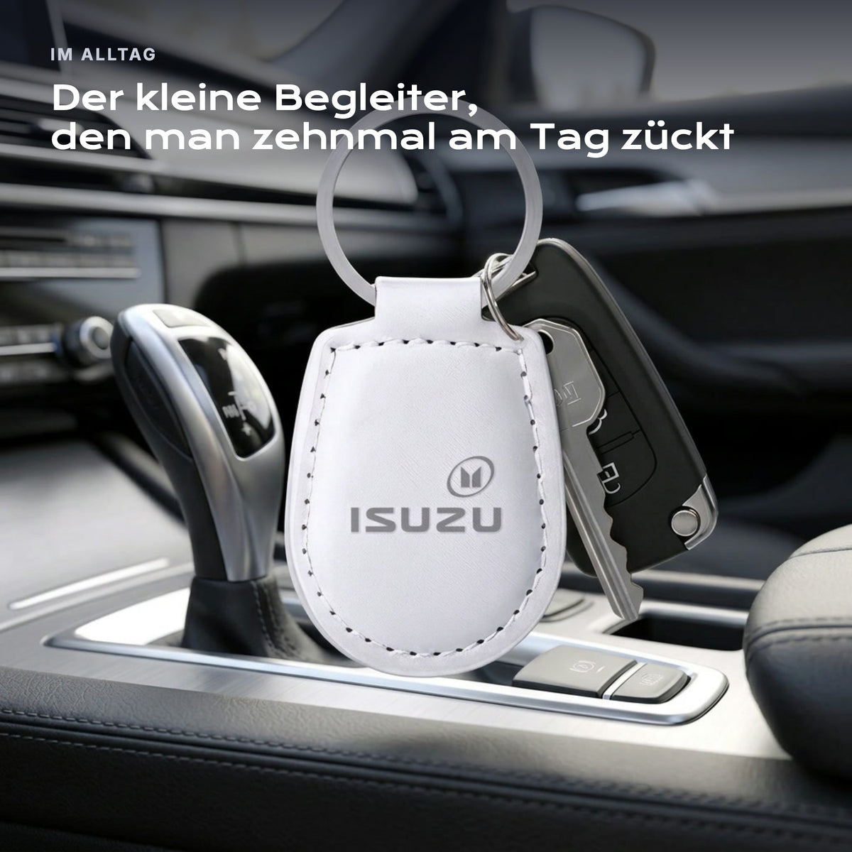 Gravierter Schlüsselanhänger Isuzu an einem Schlüssel