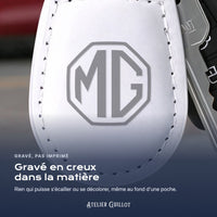 Logo MG gravé au laser dans le simili cuir
