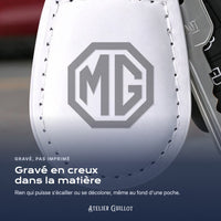 Logo MG gravé au laser dans le simili cuir