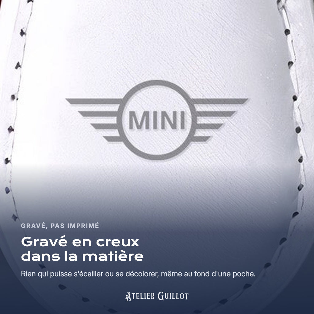 Logo Mini gravé au laser dans le simili cuir