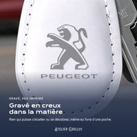 Logo Peugeot gravé au laser dans le simili cuir
