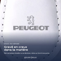 Logo Peugeot gravé au laser dans le simili cuir