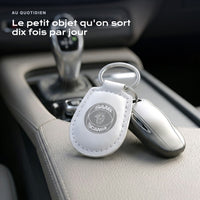 Porte-clés Saab-Scania gravé, accroché à une clé