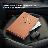 Porte-documents Audi A7 posé sur un siège, avec des factures