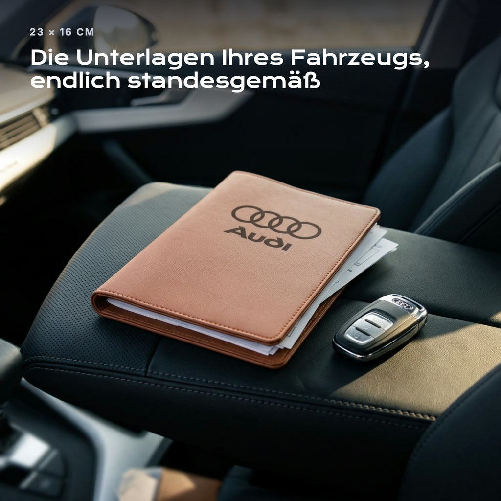 Fahrzeugmappe AUDI auf einem Autositz, mit Rechnungen