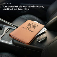 Porte-documents DODGE posé sur un siège, avec des factures
