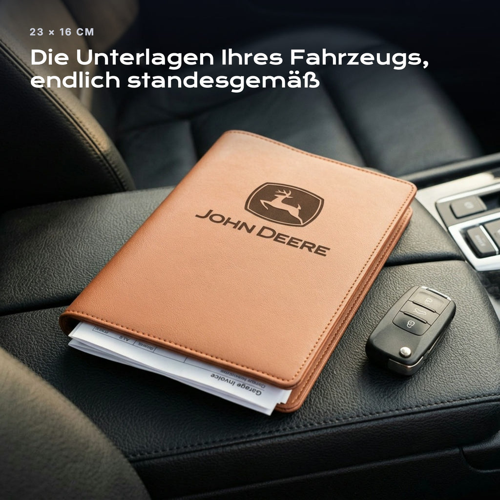 Fahrzeugmappe JOHN-DEERE auf einem Autositz, mit Rechnungen