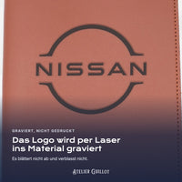 Logo NISSAN, per Laser in Kunstleder graviert
