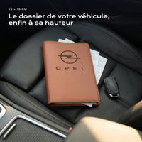 Porte-documents OPEL posé sur un siège, avec des factures