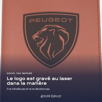 Logo PEUGEOT gravé au laser dans le simili cuir
